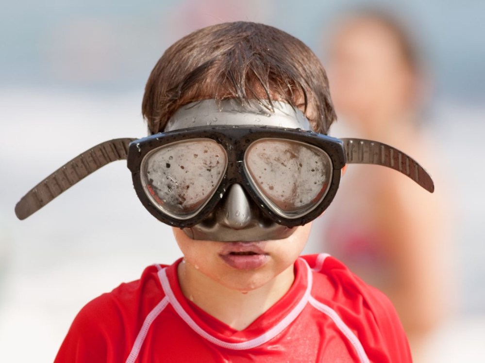Start with clean lenses and follow the mask manufacturer's care instructions.