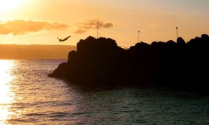 a sunset over a body of water
