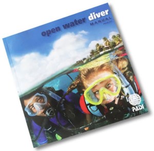 PADI Open Water Manual for a Maui scuba certification course.