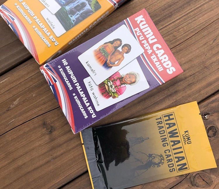 Kumu Cards Hawaiian language and culture card decks displayed on a wooden table.